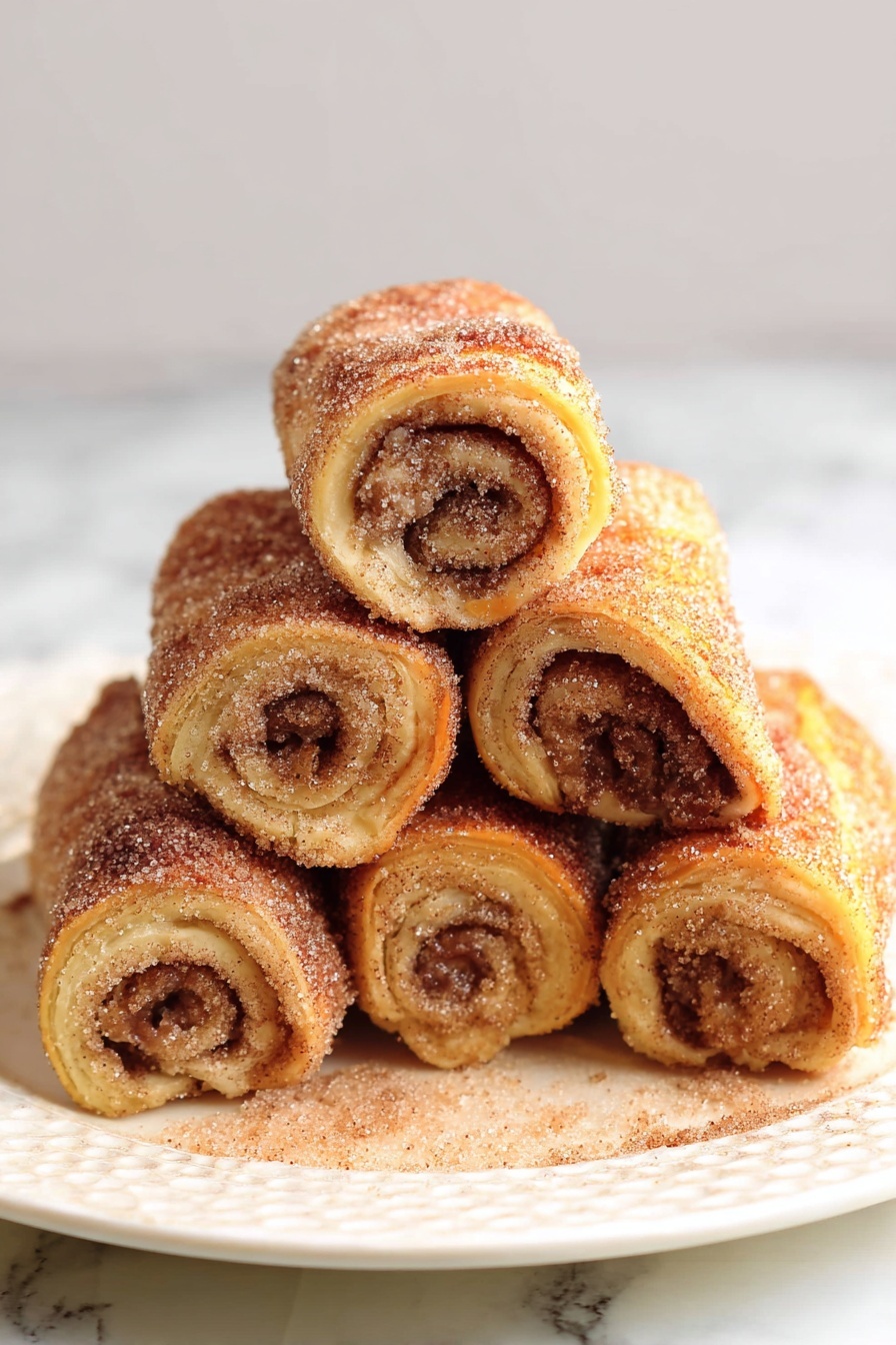The image shows a stack of six rolled cinnamon sugar sticks on a white plate placed on a white marbled surface. Each stick has a golden-brown color with visible swirls of cinnamon inside and a sugar coating sprinkled on top, giving a slightly rough texture. The sticks are arranged in two layers: the bottom layer has four rolls lying side by side, and the top layer has two rolls stacked neatly on top, forming a pyramid shape. The sugar crystals sparkle slightly, adding a touch of shine to the warm tones of the rolls. Photo taken with an iphone --ar 2:3 --v 7